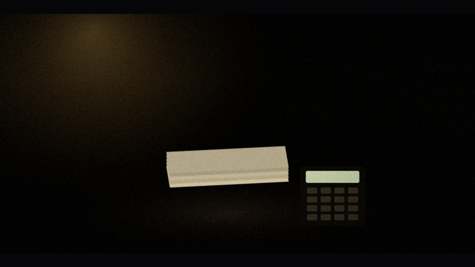 Stack of bills and a calculator on a dark table, illustrating the paycheck to paycheck mindset